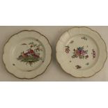 Two Worcester plates, one decorated in colours with a bouquet of flowers and sprays, the other