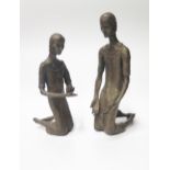 Two Bronzed Resin Kneeling Figures (tallest 31.5cm)