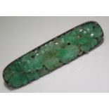 A Chinese Carved and Pierced Jadeite and Silver Mounted Brooch, 51mm wide, 8.4g
