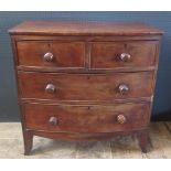 Antique Mahogany Bow Front Chest of Drawers. Two over three Drawers with Wood Handles. H. 88cm, W.