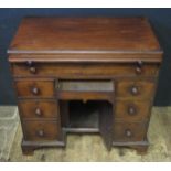 A Georgian Mahogany Knee Hole Desk with oak brush slide and 'hidden' frieze drawer, 81cm w x 49cm