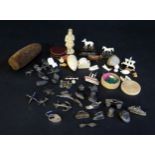 A Collection of 19th Century Bone and Ivory Miniatures, white metal charms, early Monopoly pieces,
