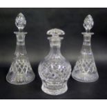 A Pair of Cut Crystal Decanters (31cm) and one other