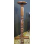 A Carved Mahogany Torchère