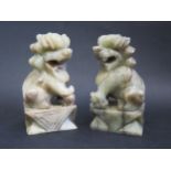 A Pair of Chinese Carved Jade Male and Female Foo Dogs, 13.5cm high