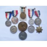 Nine Royal Coronation Medallions and one other