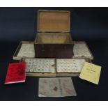 Wood Cased Mahjong Set. Hinged lid with five trays containing Bone and Wood markers. 25.5cm long
