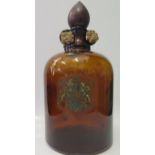 A Brown Glass Demijohn decorated with Royal Crest transfer