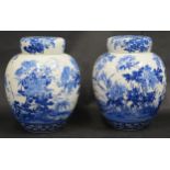 A Large Pair of Chinese Qing Porcelain Blue and White Jars with stoppers and covers decorated with