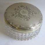 A Victorian Silver Top Cut Crystal Dressing Table Pot with engine turned and chased foliate scroll
