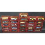 Twenty-six Matchbox Models of Yesteryear Cars in Maroon Boxes
