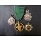 An Exeter & District Cricket League 1937 Silver Medallion Fob, one other silver, one bronze and Girl
