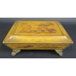 A 19th Century Yellow Japanned Two Handled Hinged Casket resting on four lion paw feet, 34(w)x27(d)