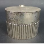 An Edward VII Silver Oval Tea Caddy with gadrooned base, 10cm wide x 8.5cm high, Sheffield 1936,