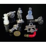 A 19th Century Coral Charm, wishing well charm, miniature model of Napoleon and other oddments