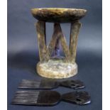 African Carved Wood Stool and Two Combs. Stool 22.5cm tall.