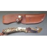 A Junglee Tak Fakuta Skinner Knife with stag antler handle by Sek, Japan and with leather sheath,