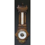 A Victorian Carved Oak Aneroid Banjo Barometer with thermometer, 105cm