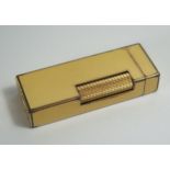 A DUNHILL Rollagas Gold Plated and Yellow Enamel Lighter. No flint