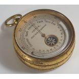 A Tucker, Bristol & Clifton Compendium Pocket Barometer with thermometer and compass to dial.