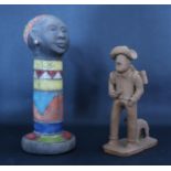 An Art Pottery Figure of Joanie from the Ndebele tribe (20.5cm) and Brazilian folk art prospector
