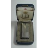 A Cased DUNHILL Barley Rollagas Silver Plated Lighter. Strikes and lights