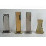 Four Dunhill Table Lighters. All striking, shaped silver plated also lighting