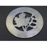 A Pierced and Plannished Silver Trivet decorated with chased sycamore leaf and seed pods, base