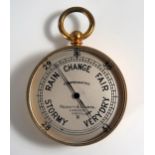 A Negretti & Zambra Compensated Pocket Barometer in a gilt metal case, no. 28029. Working