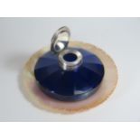 A Bristol Blue Slice Cut Glass Inkwell with Sheffield plate mounts, 12cm diam. and sitting on a