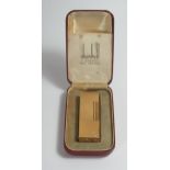 A Cased DUNHILL Barley Rollagas Gold Plated Lighter. No flint