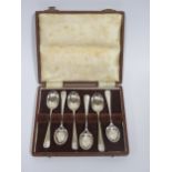 A Cased Set of Elizabeth II Coronation Silver Teaspoons stamped with the Queen's bust to the bowl,