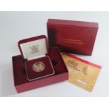 An Elizabeth II Royal Mint 2002 United Kingdom Gold Proof Half Sovereign, boxed with COA