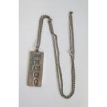 An Elizabeth II Silver Jubilee Ingot Pendant, c. 52mm drop, on chain, 40.7g