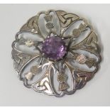 A Scottish IONA Silver and Amethyst Brooch with Celtic and thistle motifs, 40mm diam., Glasgow