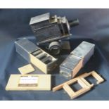 An Ensign Optiscope No.6 Slide projector with Aldis butcher 6" Focus Lens and family slides