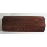An Indo Persian Carved Sandalwood Quill Pen Box with intricately carved foliate and animal