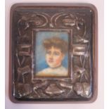 An Arts & Crafts Silver Frame with hand painted miniature of a lady, 11.5x10.5cm