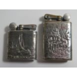 Two Dutch White Metal Mounted Lighters
