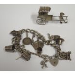 A Silver Charm Bracelet (50g) and Chinese .90 silver rickshaw ornament