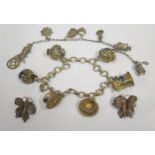 A Silver Gilt Filigree and Enamel Charm Bracelet, pair of butterfly screw back earrings and one