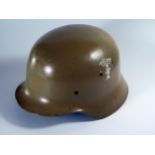 A WWII German Repainted Afrika Korps Helmet