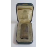A Cased DUNHILL Mirrored Palladium Rollagas Lighter, 25414. Strikes and lights