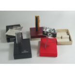 Two Boxed RONSON Lighters and Photo Flash Table Lighter. Both Ronson lighting, camera lighter
