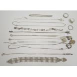 A Selection of Silver Jewellery including a gate link bracelet, one other bracelet, lockets, chains,