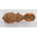 A 19th Century Continental Treen Nutcracker with profuse carved decoration, 10 cm