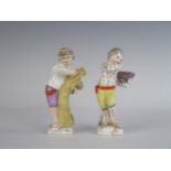 A Pair of Berlin Porcelain Figurines representing the months of August and September, 10 cm.