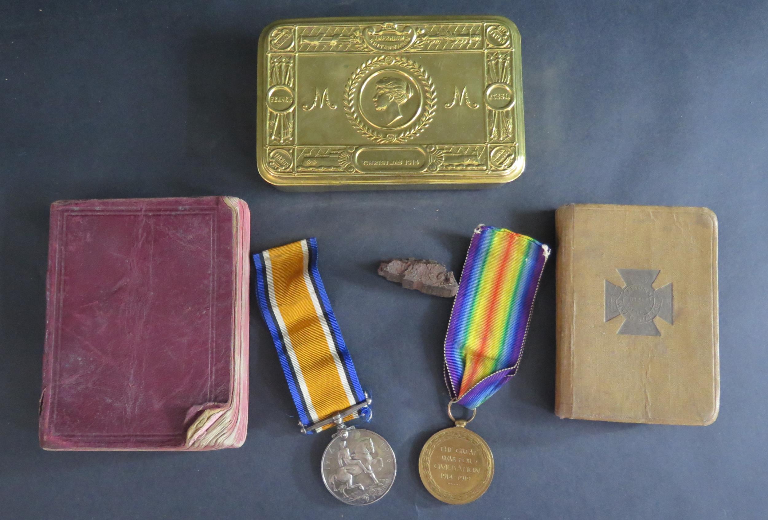A WWI Two Medal Group awarded to 45440 PTE. G. NOON. H.L.I., a Christmas 1914 tin with piece of