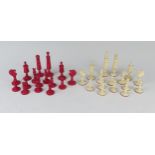 A 19th Century Carved and Stained Bone Chess Set, kings 87 mm, pawns 36 mm