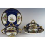 A Pair of 18th Century Meissen Blue Lapis Ground Ecuelles and Covers with Saucers decorated with